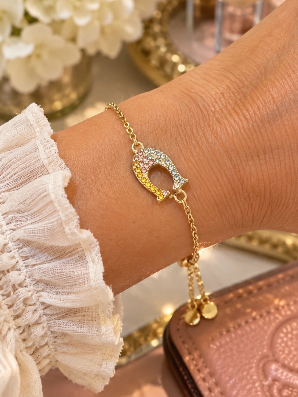 COACH Gold Tone Signature C Pavé Crystal Adjustable Bracelet